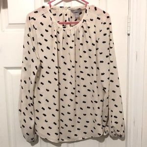 White and black patterned blouse